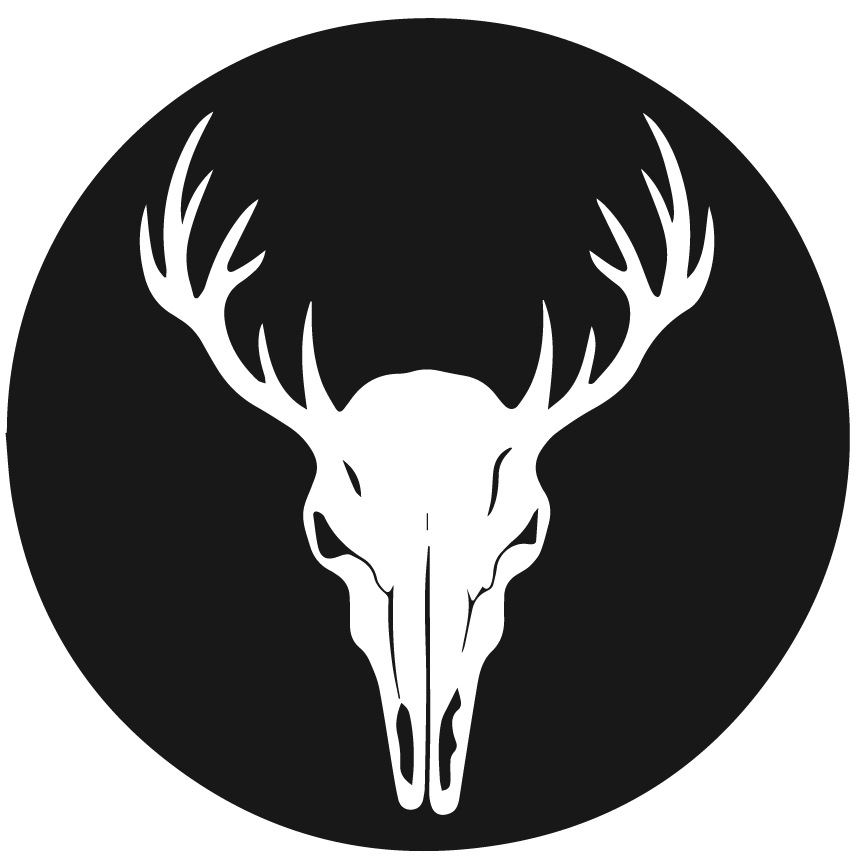stag skull in a dark grey circle moving logo